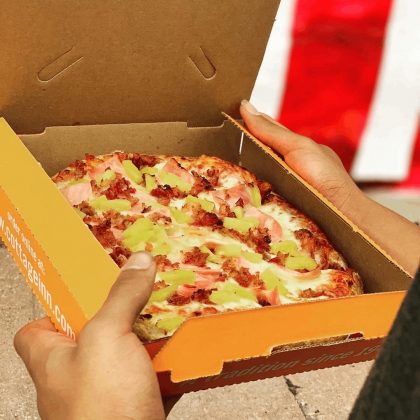Pizza in a deep dish box